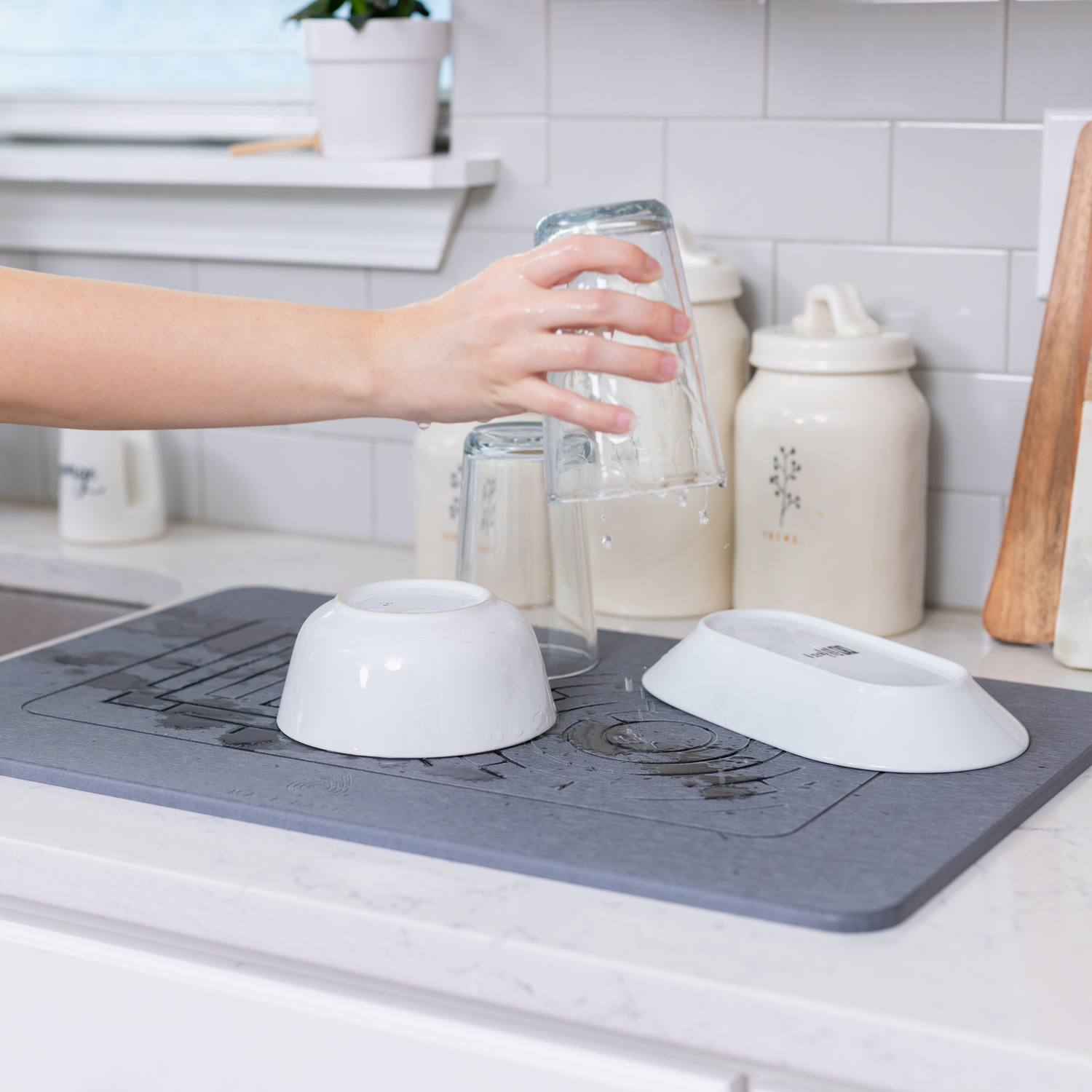 A durable diatomaceous earth mat protecting a granite countertop.