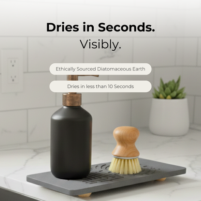 Drying rack with black bottle and wooden brush on a kitchen counter, text indicating quick drying.